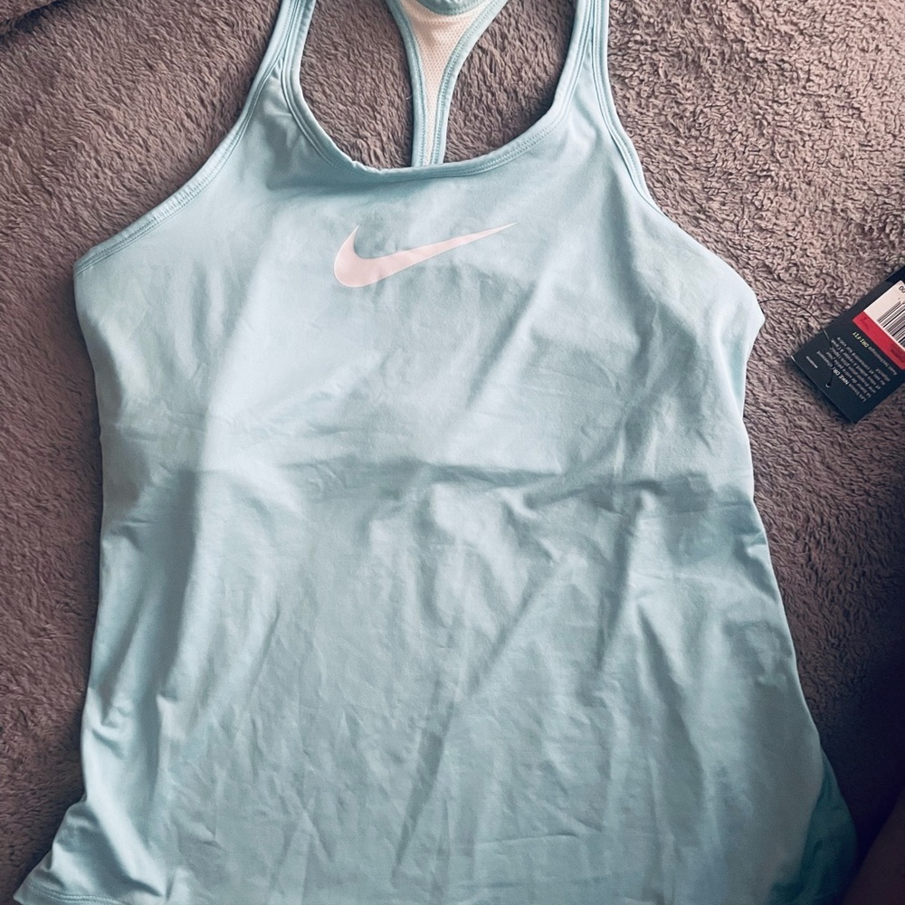 Nike dry fabric moves sweat from your skin.Helps you stay dry.